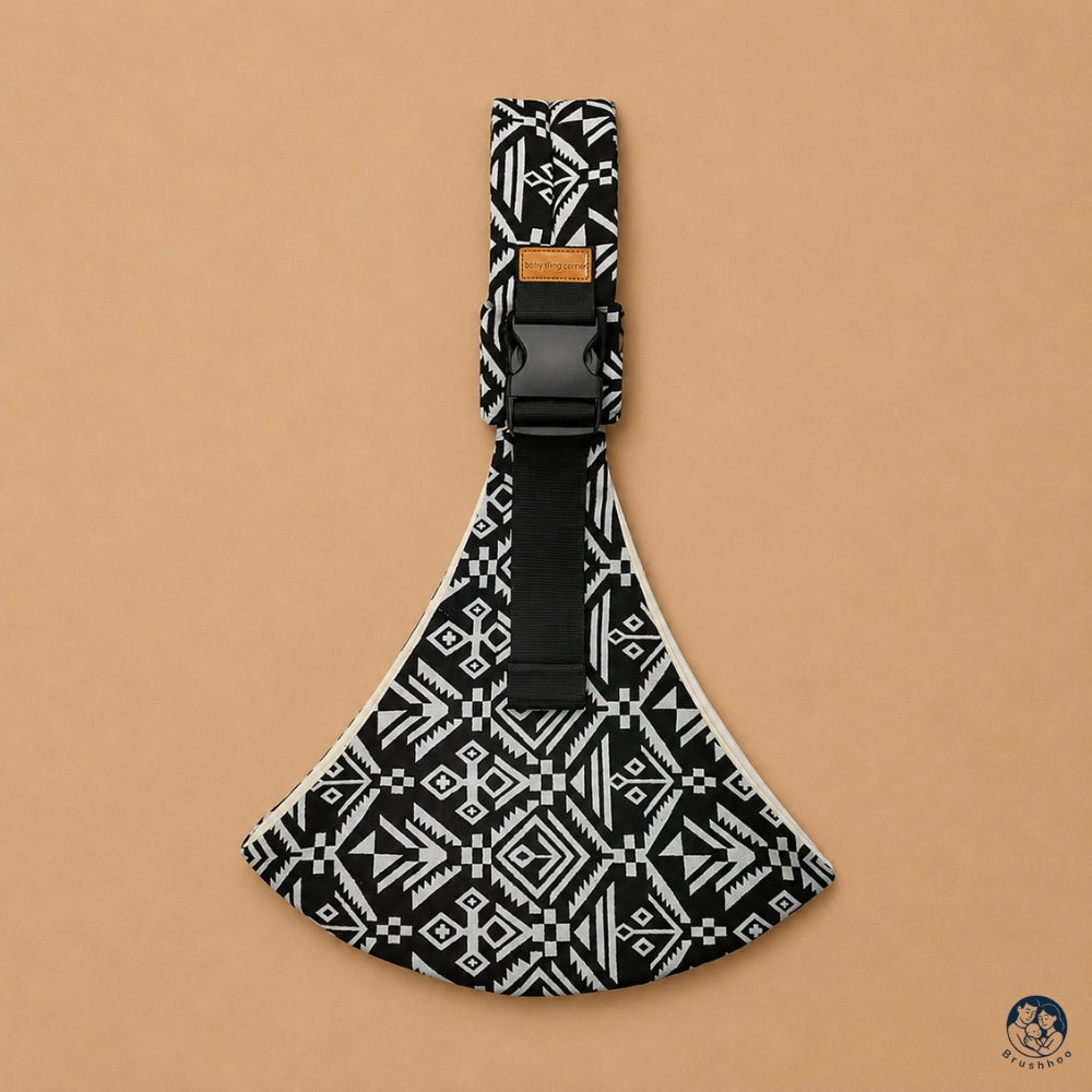 Porte bébé sling motif aztek noir de la marque brushhoo vue de face