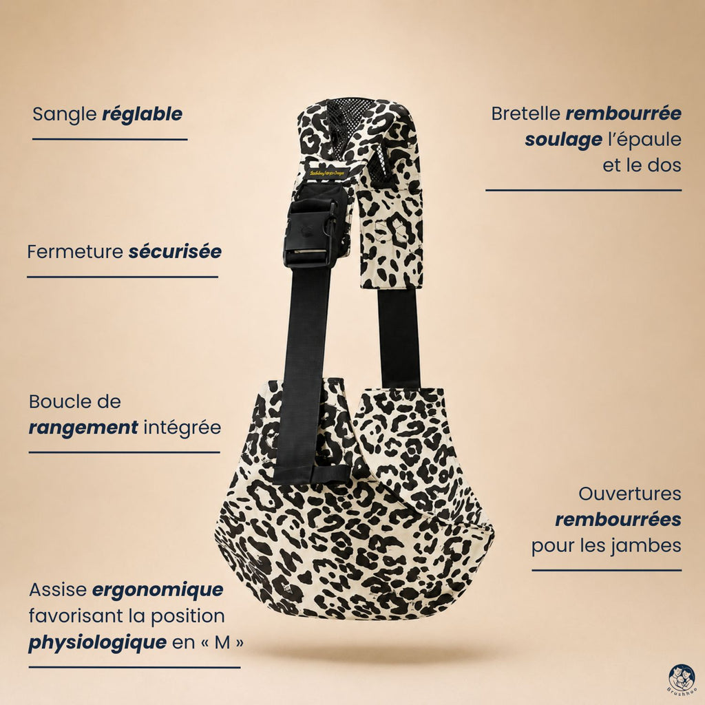 Porte-bébé sling léopard ecru vue de côté sur un fond beige nuancier. Avec les caractéristiques et bienfaits du sling